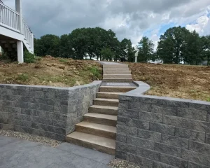 Retaining wall surrounding pool